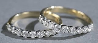 Pair of 0.75tcw diamond and 14kt gold bands.