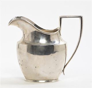 An American Silver Water Pitcher, Currier & Roby, New York, First Half 20th Century, Height 7 7/8 inches.