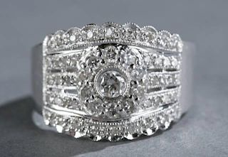 Diamond and 14kt white gold ladies band.