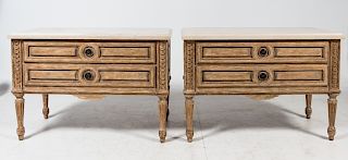 A Pair of Holly Hunt Gilt-Rubbed Painted Commodes and Limestone Tops Height 30 x width 43 x depth 22 inches.