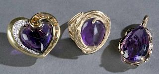 Three diamond and amethyst pieces of jewelry.