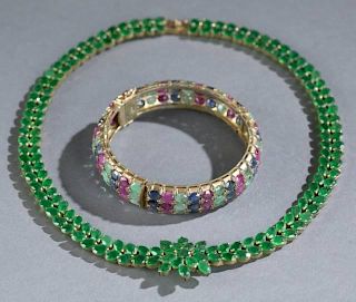 Emerald necklace and multi precious stone bangle.