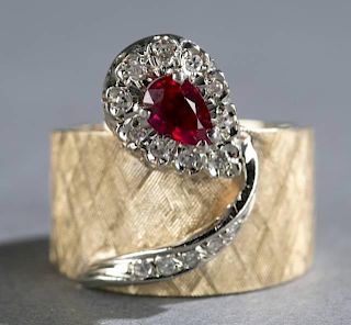 Ruby and diamond 14kt yellow gold ring.