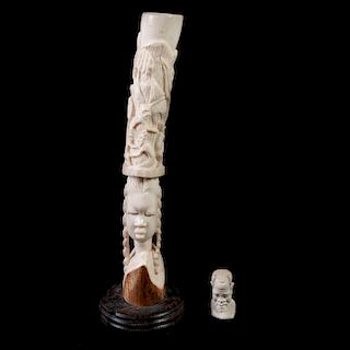 Colmillo y busto miniatura. África, siglo XX. Tallas en marfil. Decorado con efigies y figuras zoomorfas. Con base de madera (uno) Deta
