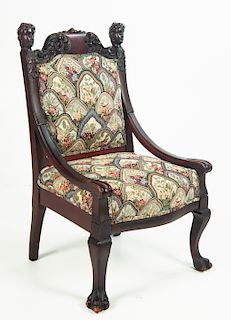 Mahogany Arm Chair with Carved Heads