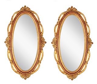 Pair of Gilt Oval Mirrors