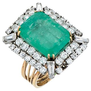 An emerald and diamond 14K yellow gold and palladium silver ring.