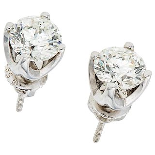 A pair of EGL USA certified diamond 14K white gold stud earrings.