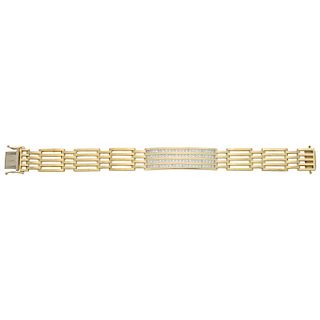 A diamond 14K yellow gold bracelet.