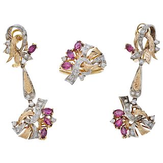 A ruby and diamond 18K yellow gold and palladium silver ring and pair of earrings set.