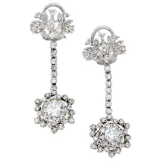 A pair of diamond palladium silver earrings.