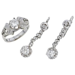 A diamond 14K white gold ring and palladium silver pair of earrings.