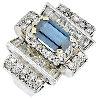 A sapphire and diamond platinum ring.