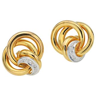 A pair of diamond 18K yellow gold earrings.