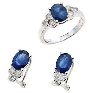 A sapphire and diamond 14K white gold ring and pair of earrings set.