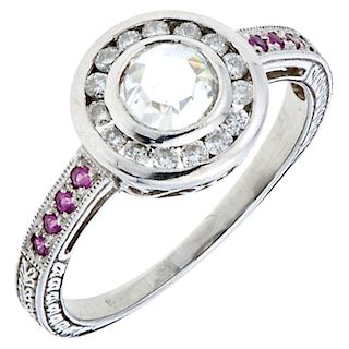 A diamond and ruby 14K white gold ring.