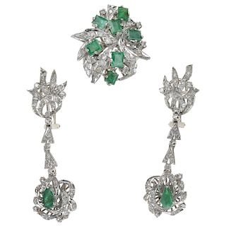 An emerald and diamond palladium silver ring and pair of earrings. 