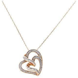 A diamond 10K yellow gold necklace and pendant.