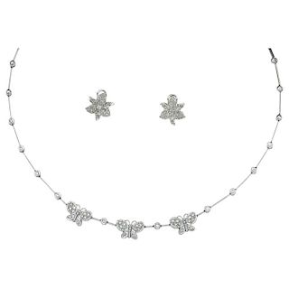 A diamond 14K white gold choker and pair of stud earrings.