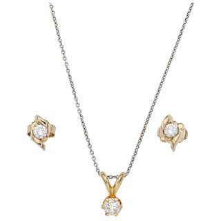A diamond 18K white gold and 14K yellow gold necklace, pendant and pair of stud earrings.