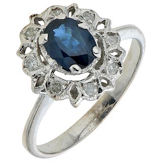 A sapphire and diamond palladium silver ring. 