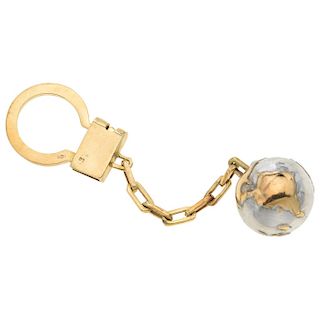 A 14K yellow and white gold key ring.