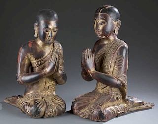 Pair of carved wood Thai monk figures.