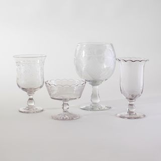 Group of Four Colorless Glass Table Articles