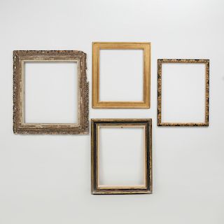 Two Baroque Style Ebonized and Parcel-Gilt Frames, a Régence Style Frame and a Giltwood Frame 