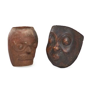 TWO POTTERY FACES