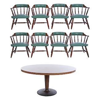 Antecomedor. SXX. En talla de madera. Consta de: Mesa cubierta circular y soporte tipo pedestal y 8 sillones con tapíz de vinipiel.