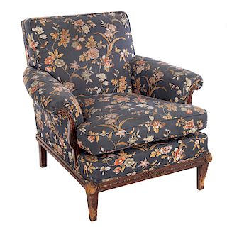Sillón. Siglo XX. Estructua de madera. Con respaldo, asientos en  tapicería de tela floral y soportes cónicos.