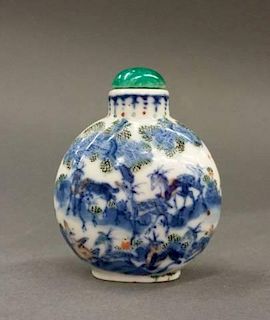 A Chinese porcelain snuff bottle.