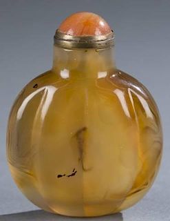A Chinese ribbed melon form agate snuff bottle.