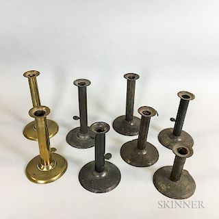 Eight Brass and Sheet Iron Hogscraper Candlesticks