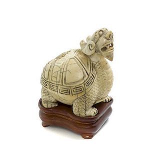 * A Chinese Carved Ivory Mythical Beast, Height 3 1/8 inches.