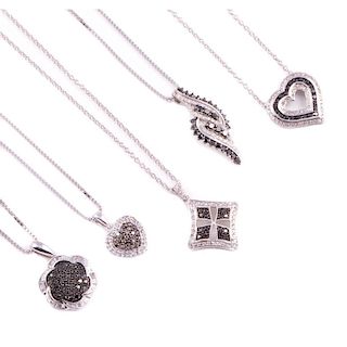 Five colored diamond and diamond pendants with chains