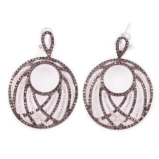 Pair of black diamond and diamond earrings