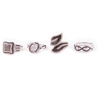 Four gem-set and sterling silver rings