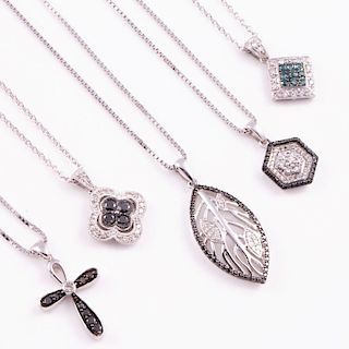 Five gem-set and sterling silver pendants with chains