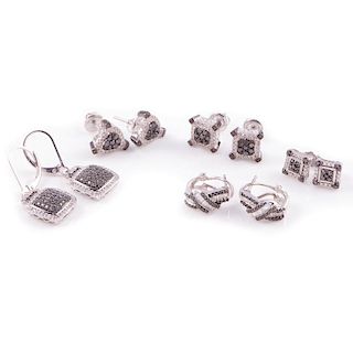 Five pairs of diamond and black diamond earrings