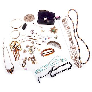 Collection of vintage costume jewelry and objects