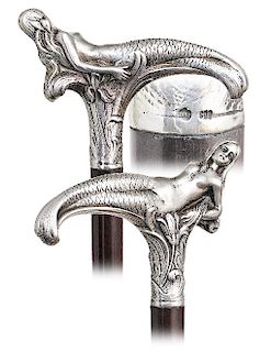12. Silver Art Nouveau Siren Cane -Ca. 1900 -T-shaped silver handle with a siren on a flowerbed, snake wood shaft and a horn ferrule. The worlds of na