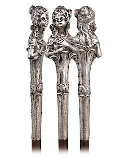 24. Silver Figural Art Nouveau Cane -Ca. 1900  -Well modeled to depict the bust of a young beauty with a charming expression on the face, flowing, lon