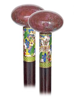 27. Ruby and Cloisonné Enamel Dress Cane -Early 1900s -Large, round and precious hard stone ruby knob of a pale red color, fine grained and close pore