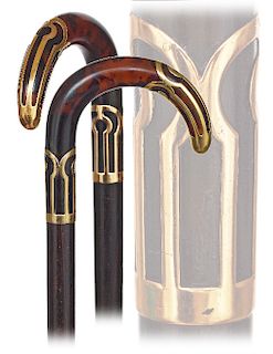 34. Tortoiseshell and Gold Cane -Ca. 1910 -Solid tortoiseshell crook handle with matching and wide yellow gold cap and collar, well streaked makassar 
