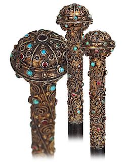 36. Silver Gilt and Jeweled Dress Cane -Ca. 1870 -Silver gilt filigree handle consisting of a longer and straight cylindrical stem topped by a ball kn