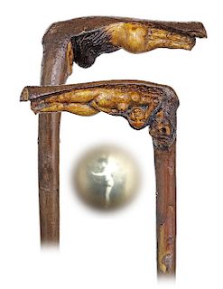 46. Erotic Folk Art Stanhope Cane -Ca. 1900 -Fashioned of a natural branch with an integral handle grown at an angle and carved to depict a reclined n