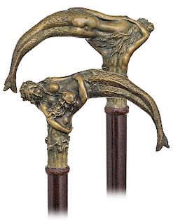 52. Knob Kerrie Figural Art Nouveau Cane -Ca. 1900 -Well modeled bronze casting of an old man in waves carying a siren on his shoulders, snake wood sh