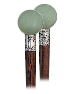 103. Hard Stone Dress Cane -Ca. 1900 -A sizeable Siberian jade ball knob of pale hues reminiscent of sky, water and verdant nature, silver collar beau